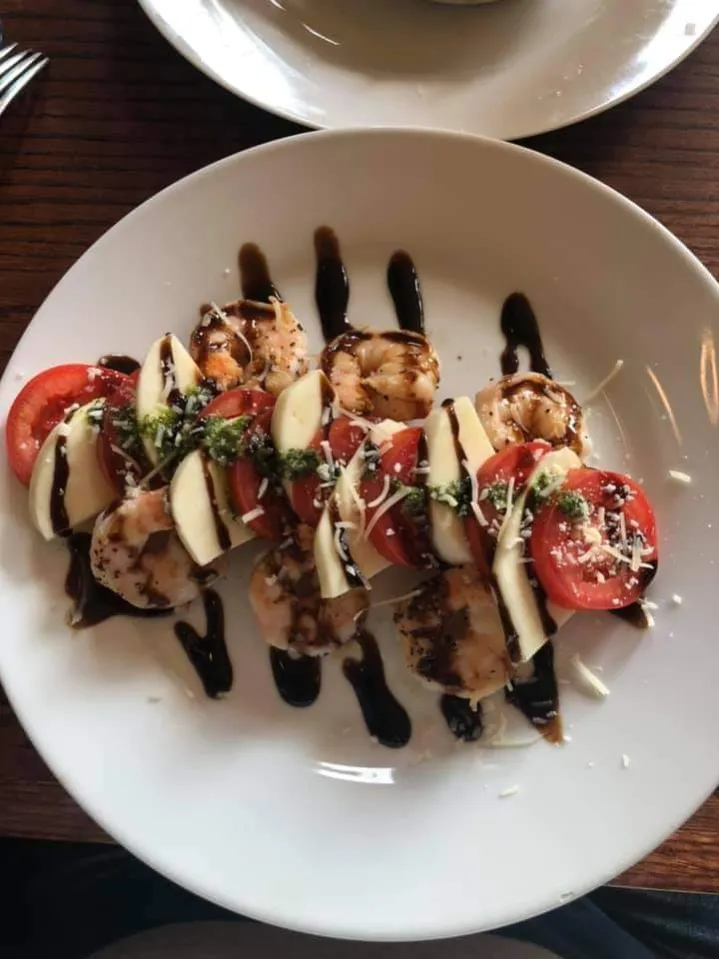 Shrimp caprese with tomato, mozzarella, and balsamic