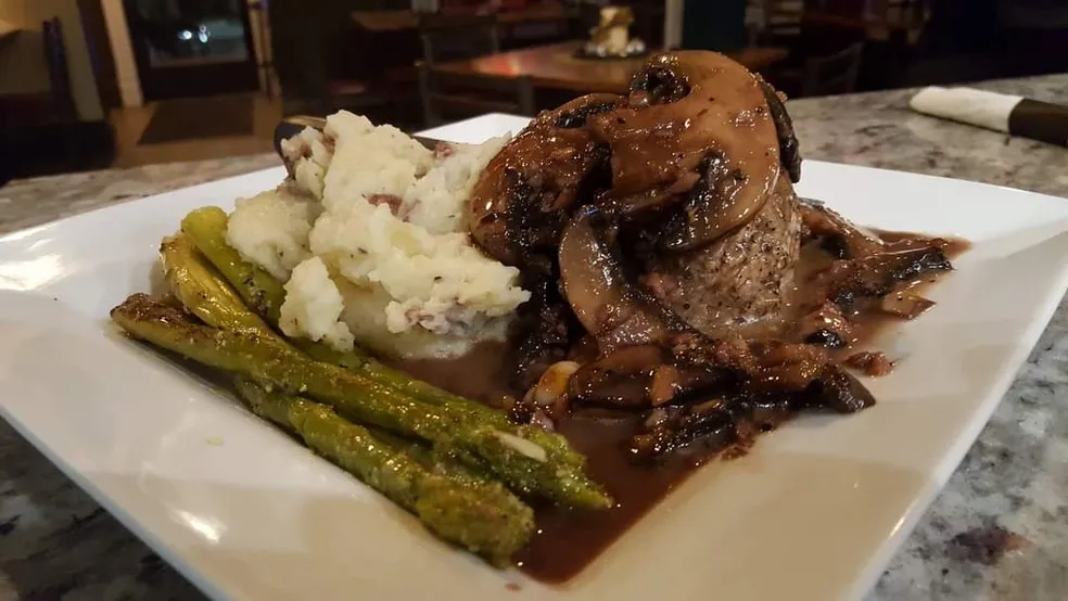 Sirloin with mushroom demi-glace and mashed potatoes