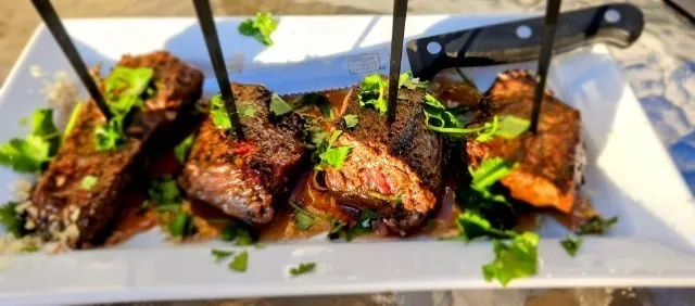 Skewered steak bites with fresh herbs