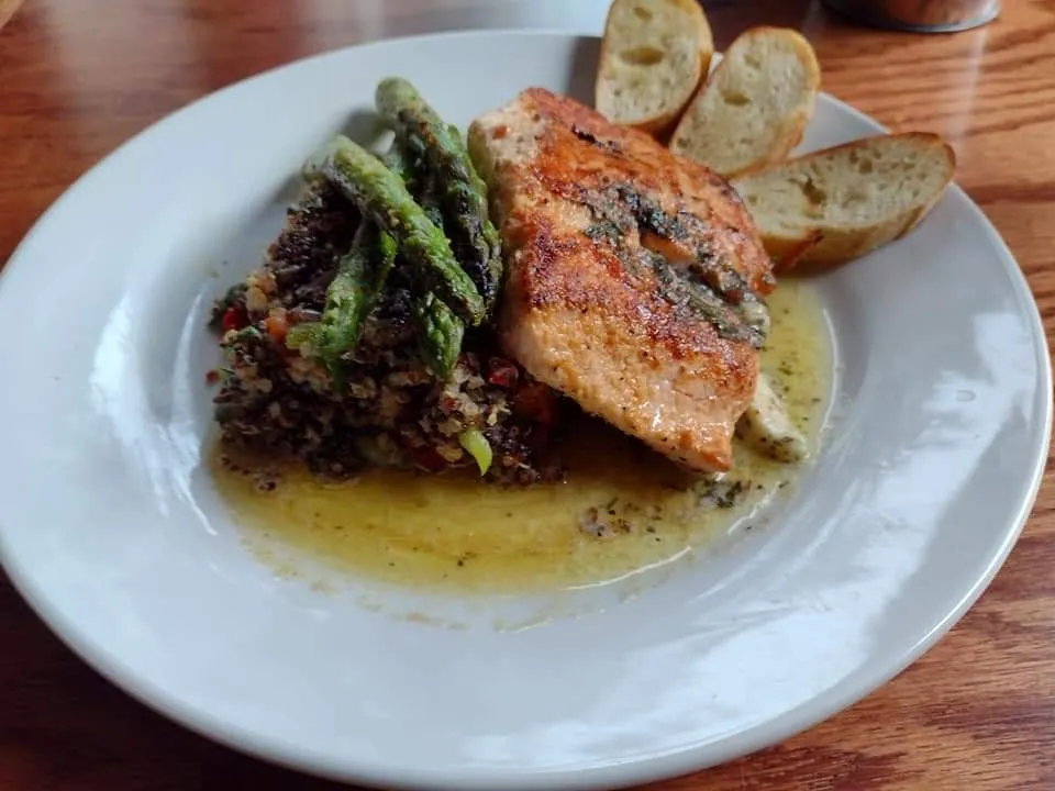Salmon with quinoa, asparagus, and baguette